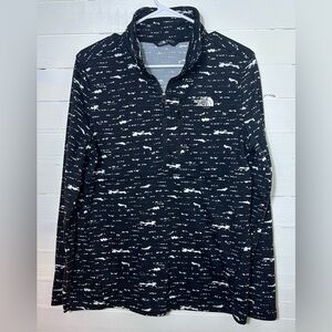 The North Face black and white pullover jacket, women’s size large.